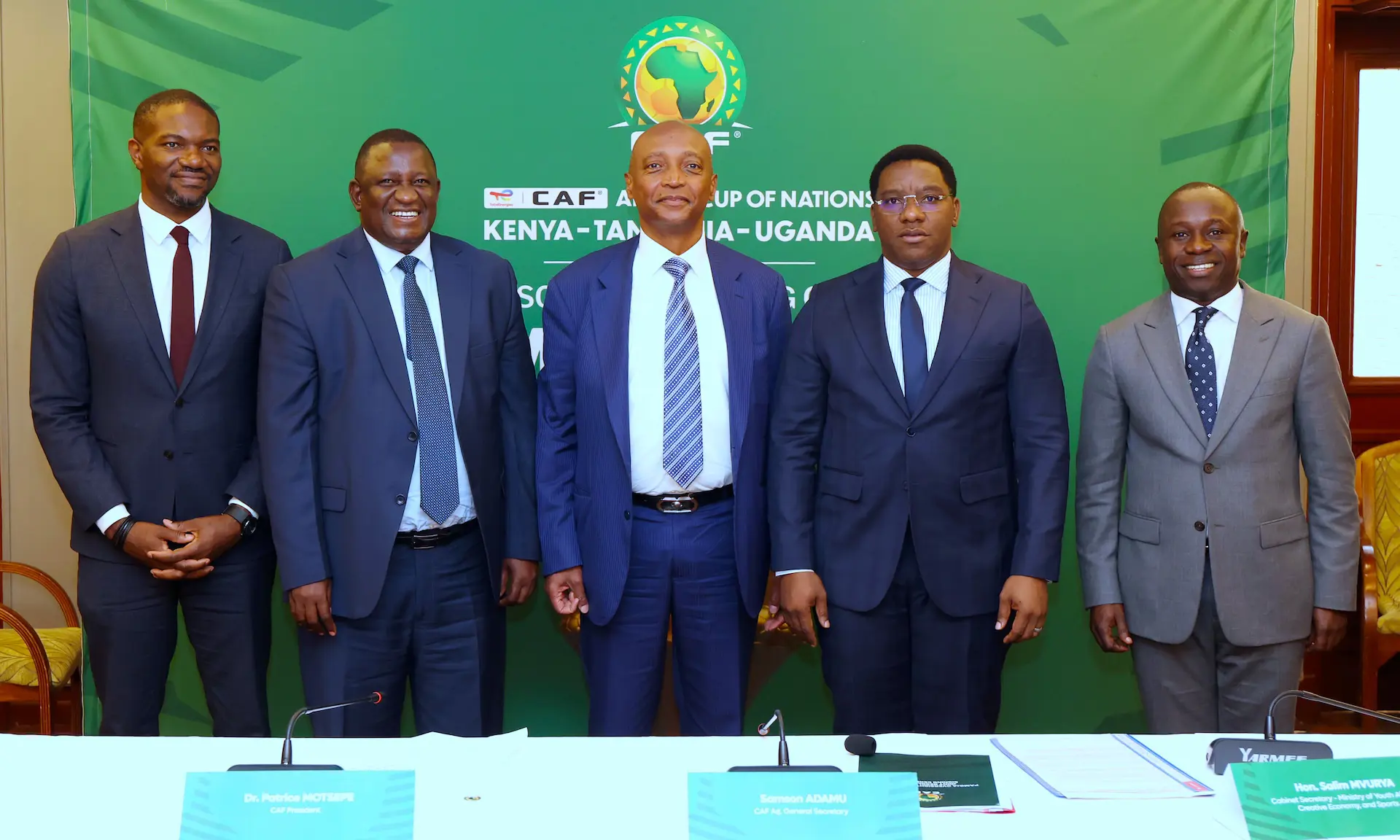 Officials pose for a group photo at a CAF meeting on AFCON 2027 preparations