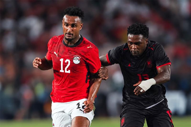 Two players battle for the ball during an AFCON 2027 qualifying match